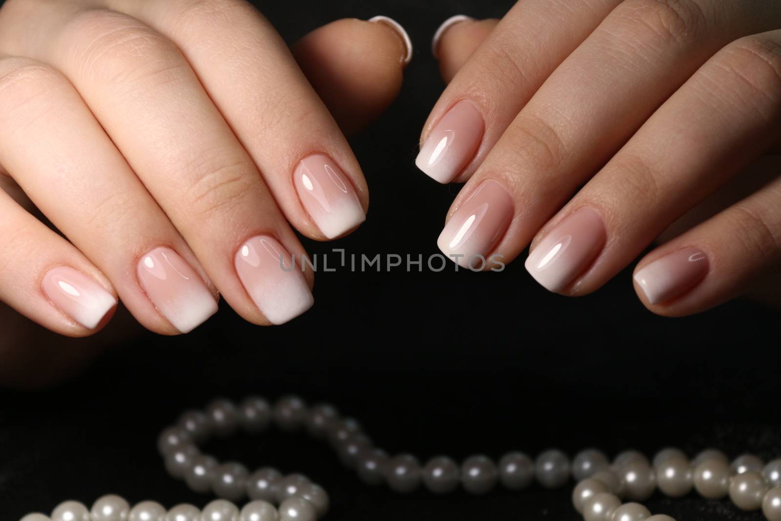 Cute manicure on female hands. Woman hands