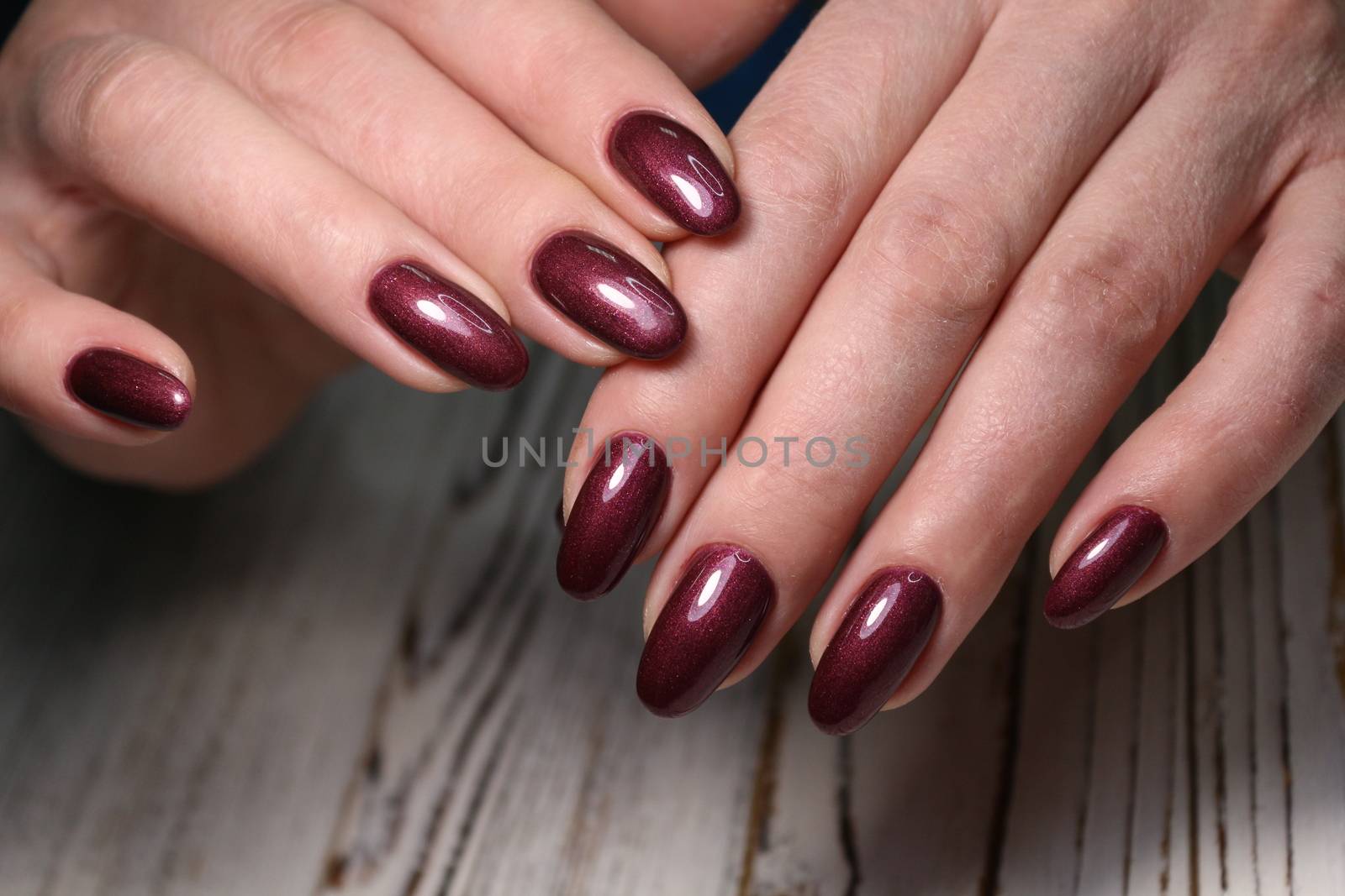 Cute manicure on female hands. Woman hands