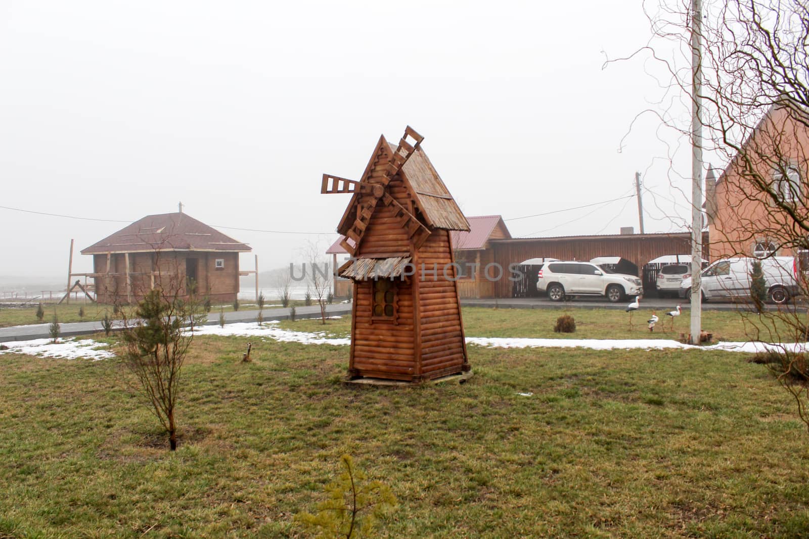 Beautiful wooden mill on a farm. Ukraine