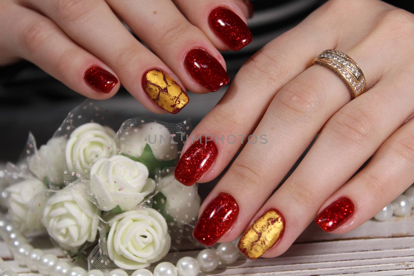 Fashionable design of manicure on beautiful pens