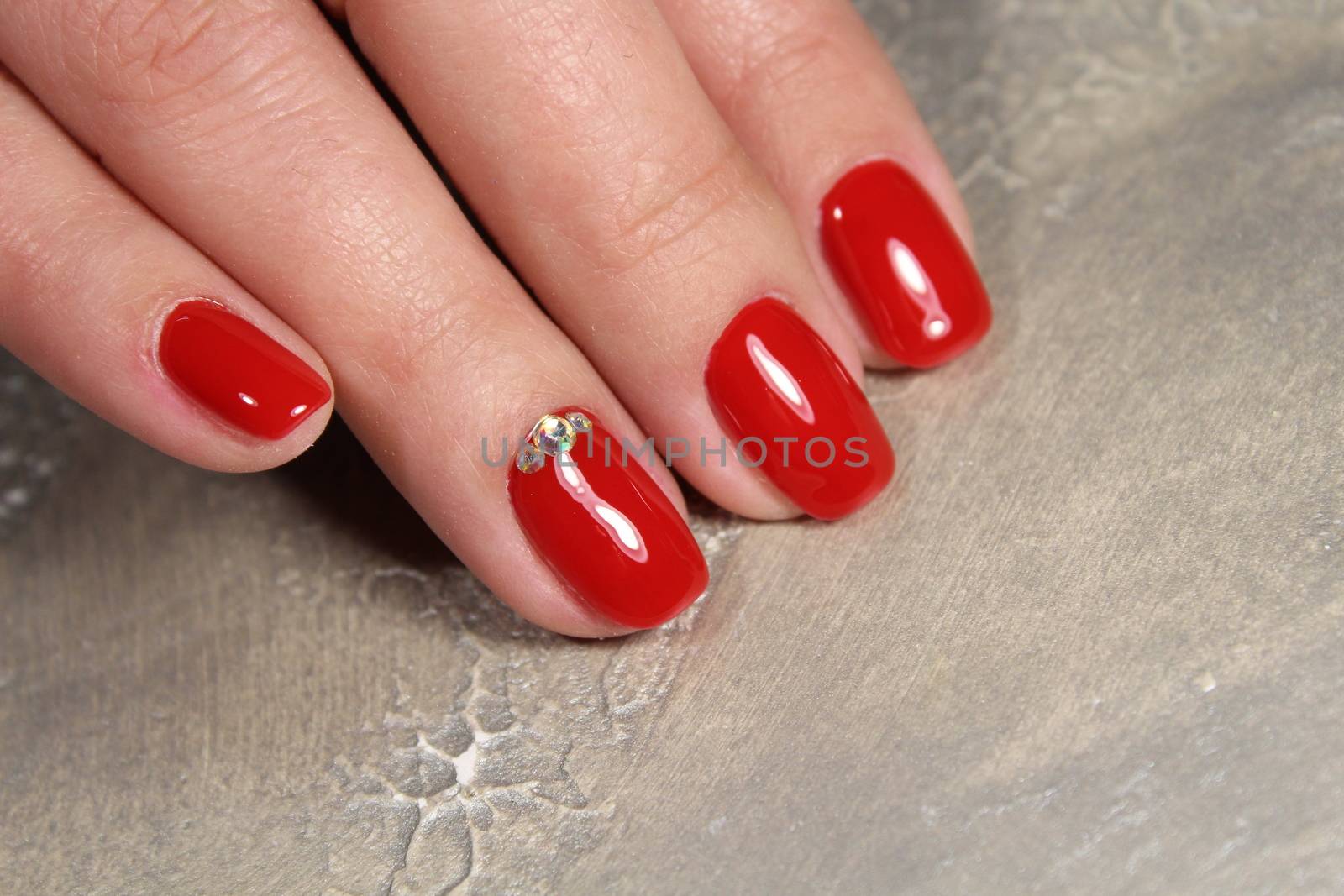 The refined beautiful female fingers with original design manicure