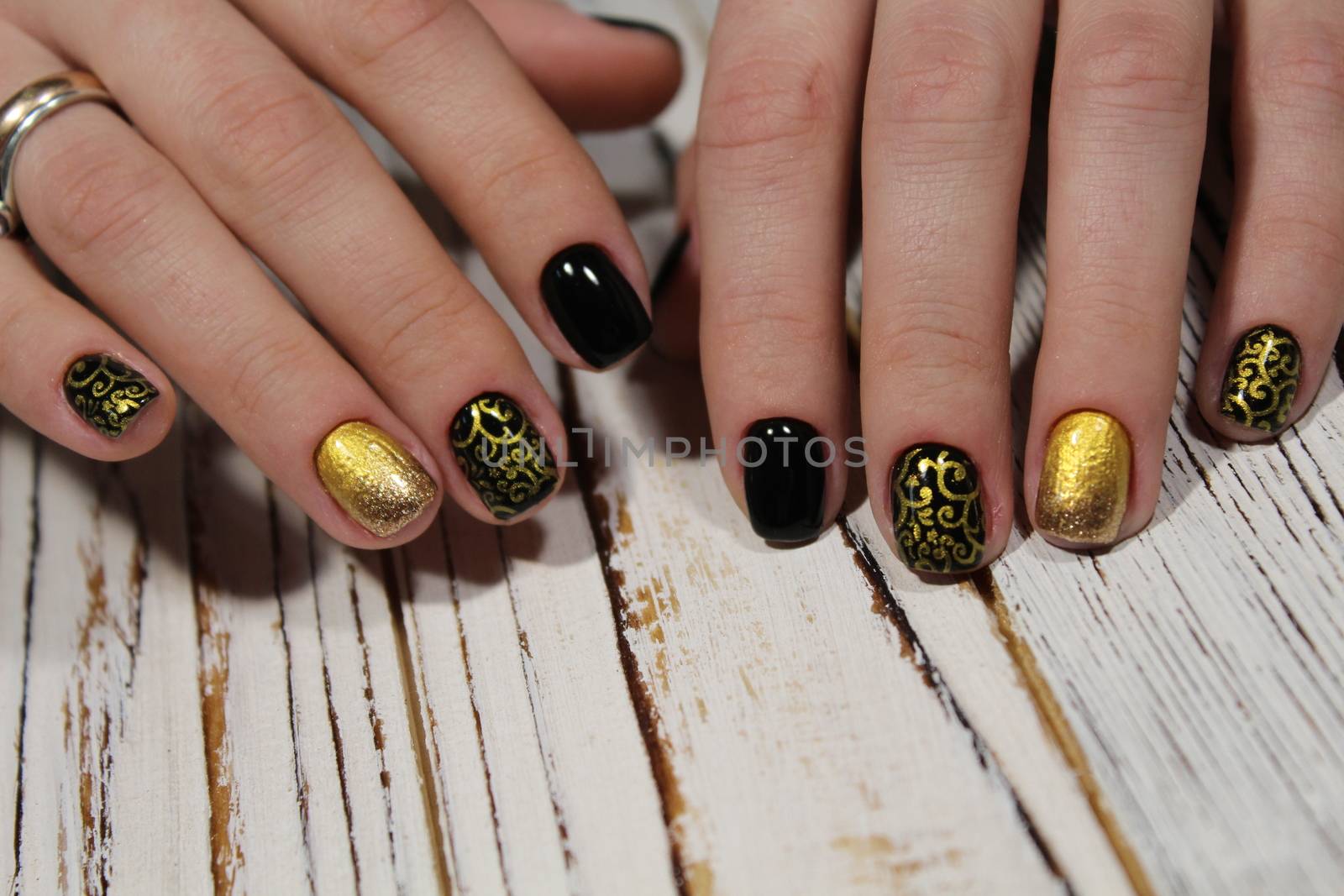 The refined beautiful female fingers with original design manicure