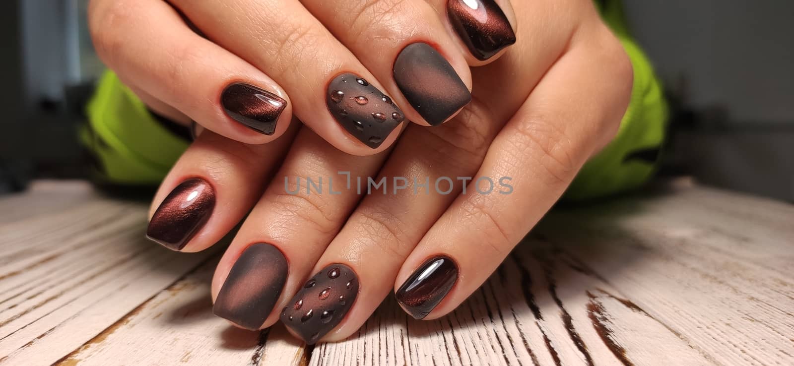 Autumn manicure. Beautyful nails design with autumn leaves. by SmirMaxStock
