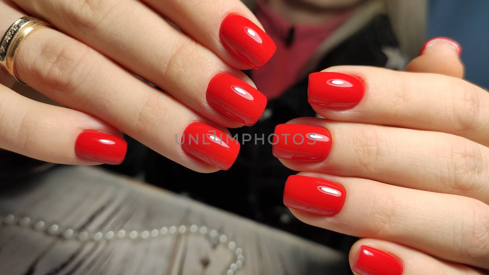 beautiful gel lacquer manicure on a textured trendy background by SmirMaxStock