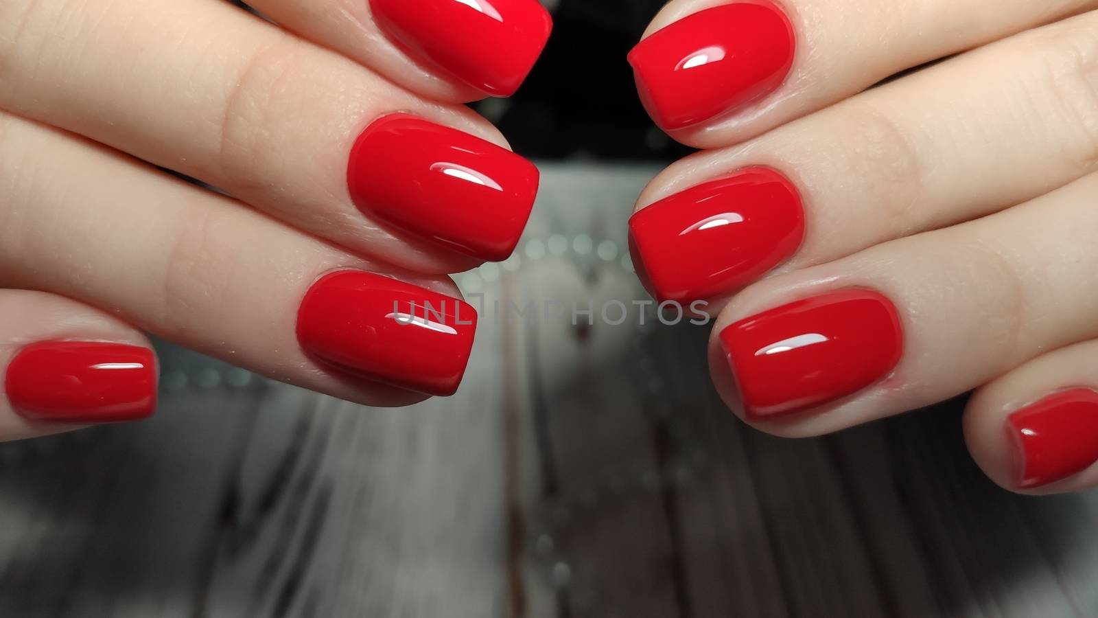 beautiful gel lacquer manicure on a textured trendy background by SmirMaxStock