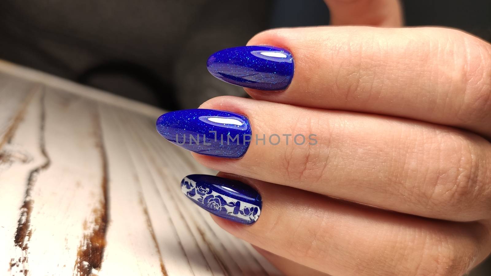 Fashionable design of manicure on beautiful pens by SmirMaxStock