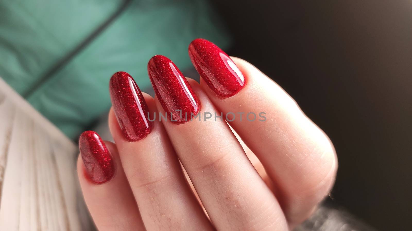 beautiful gel lacquer manicure on a textured trendy background by SmirMaxStock