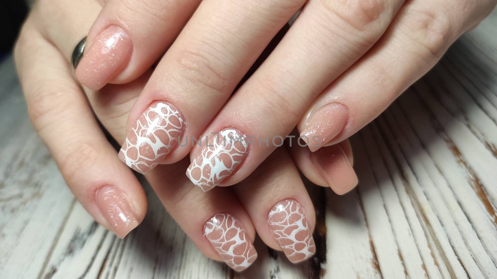 Youth manicure design, beautiful female hands with sexy manicure. by SmirMaxStock