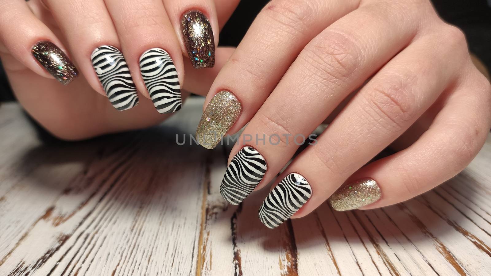 Youth manicure design, beautiful female hands