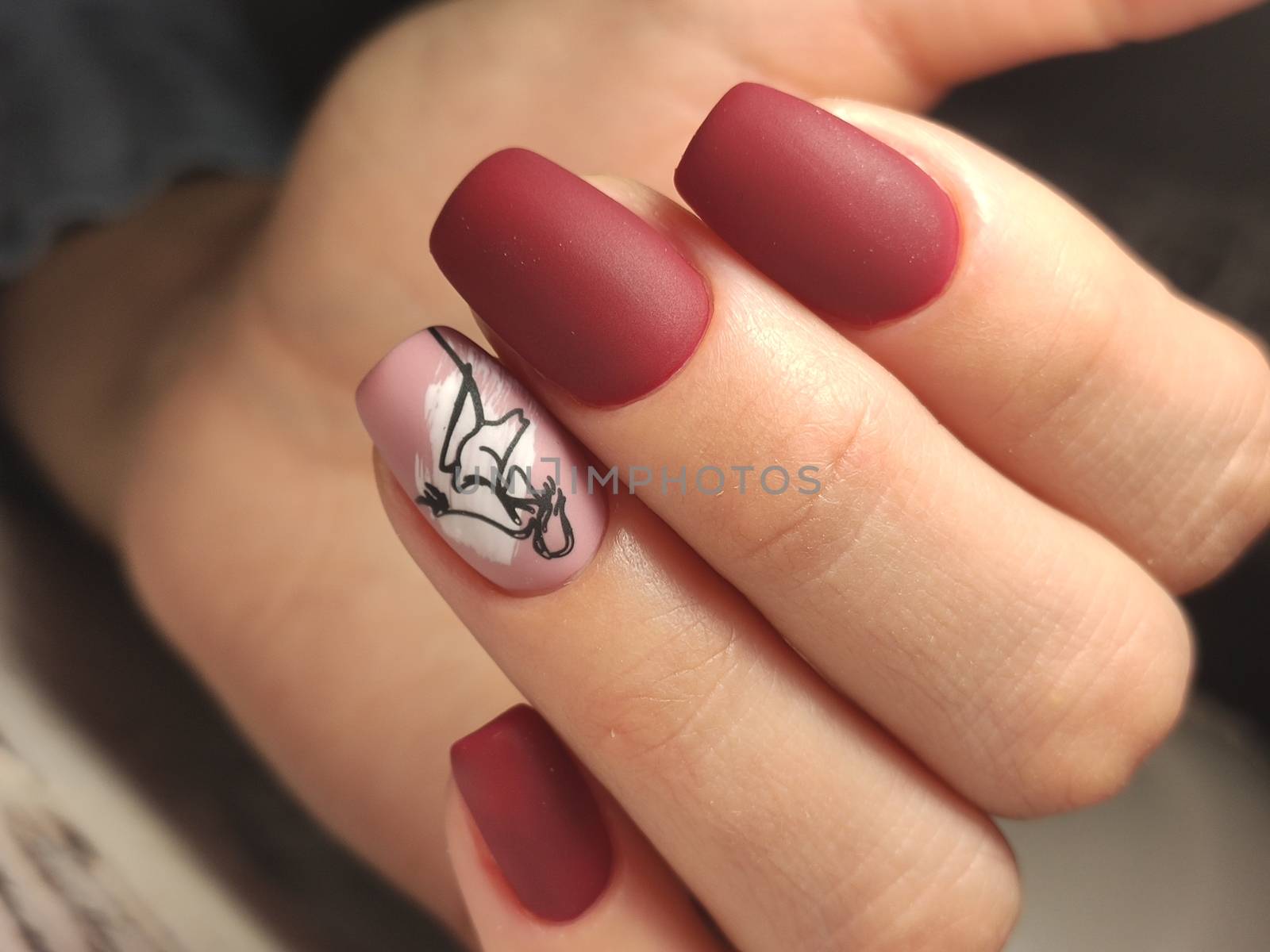 Autumn manicure. Beautyful nails design with autumn leaves. Top view. cozy autumn image.
