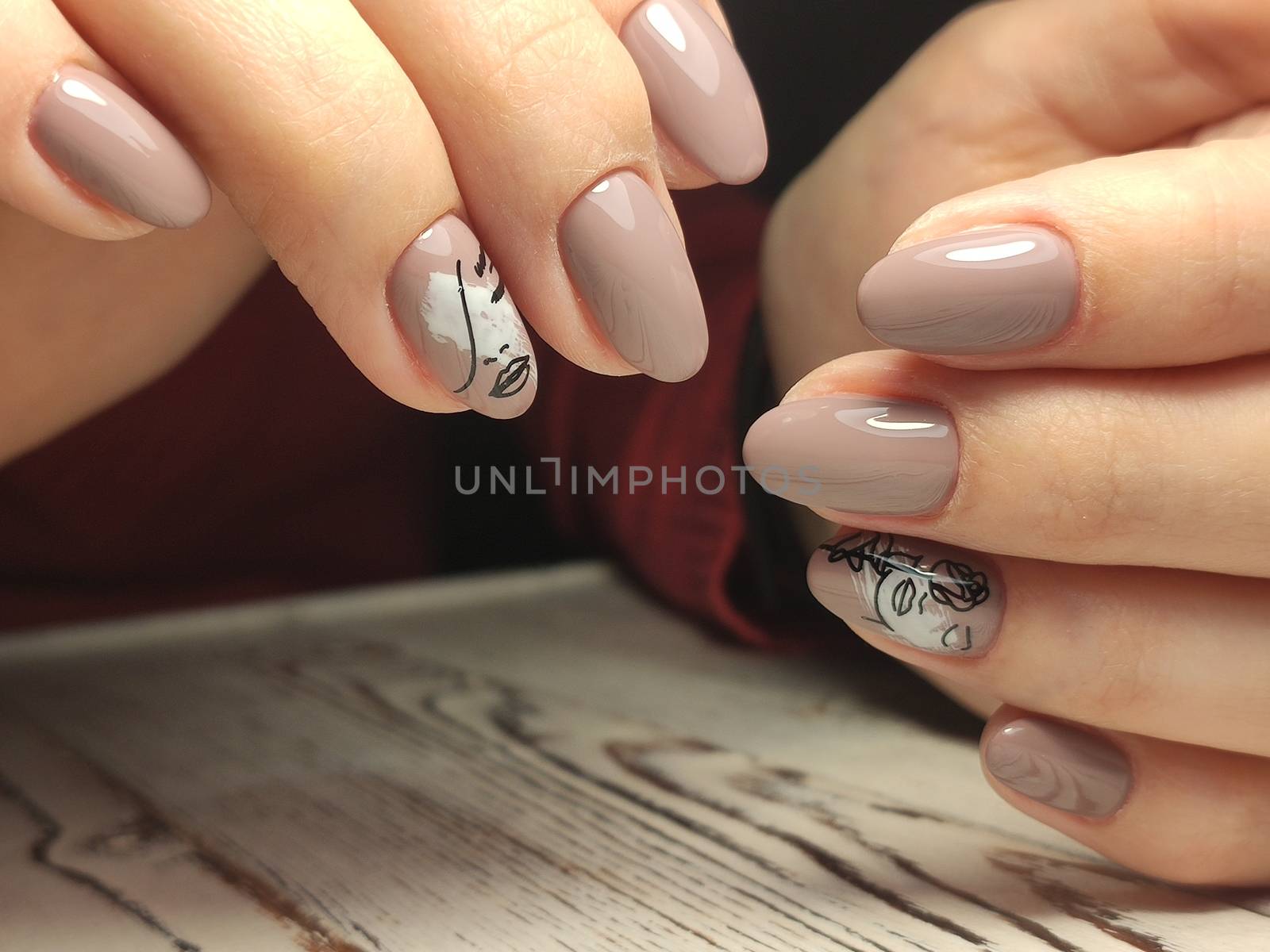 Autumn manicure. Beautyful nails design with autumn leaves. by SmirMaxStock