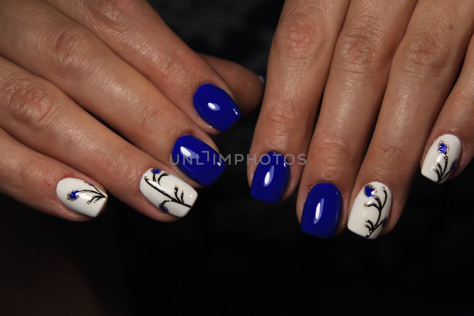 Youth manicure design by SmirMaxStock