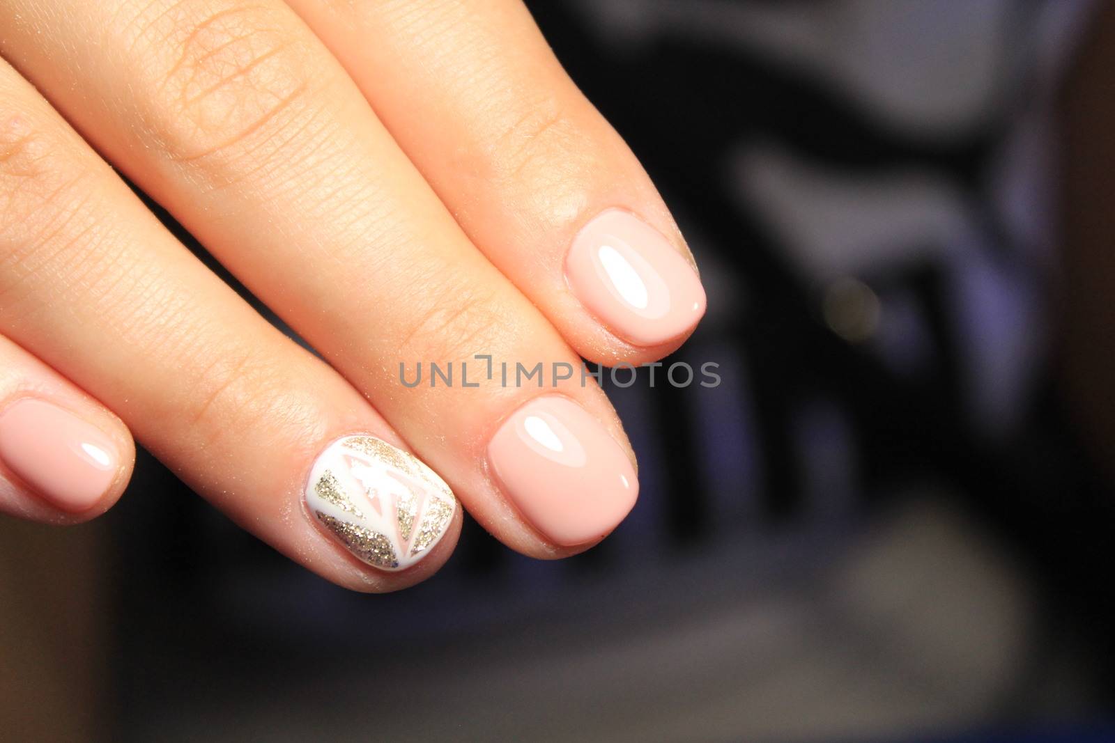 glamorous beautiful manicure on a trendy texture background