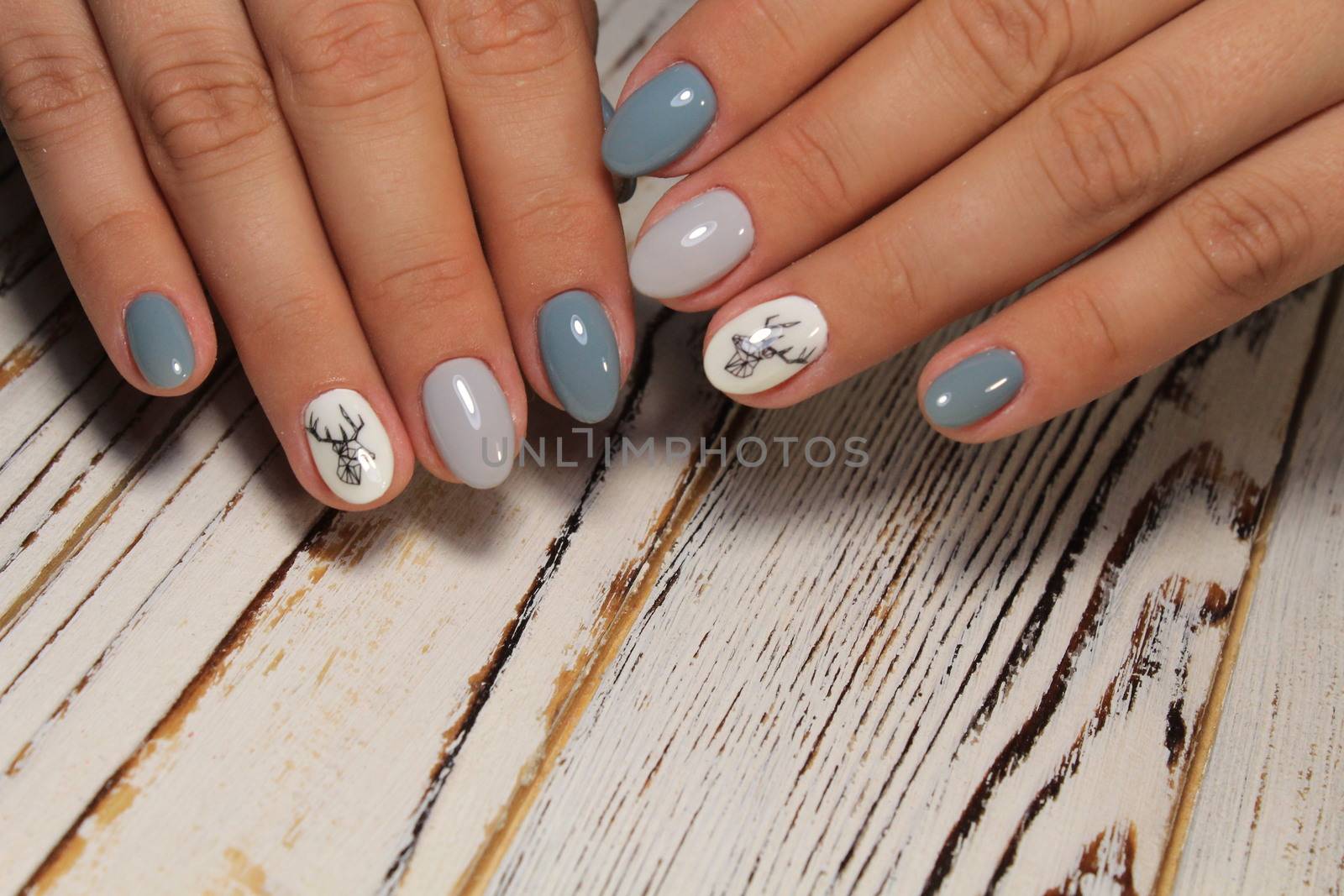 fashion manicure with a design on a beautiful texture