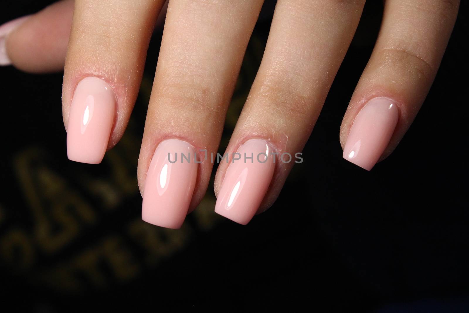 glamorous beautiful manicure on a trendy texture background