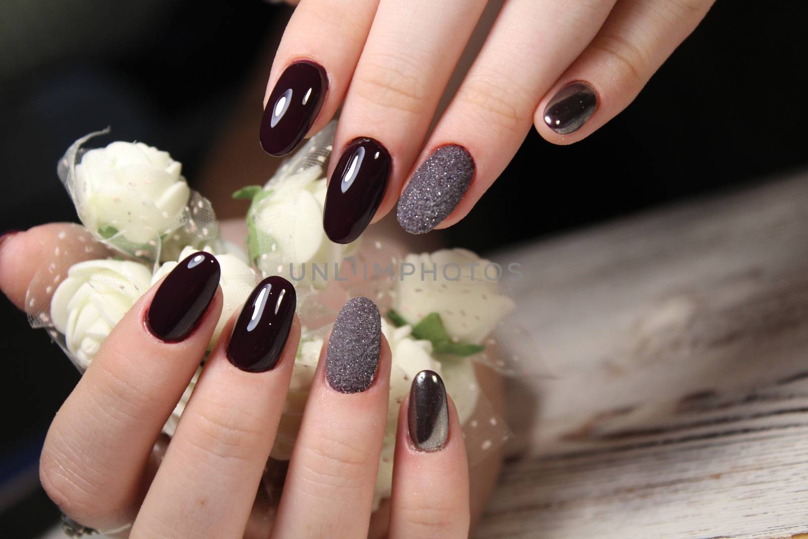 Stylish manicure nails color black and silver