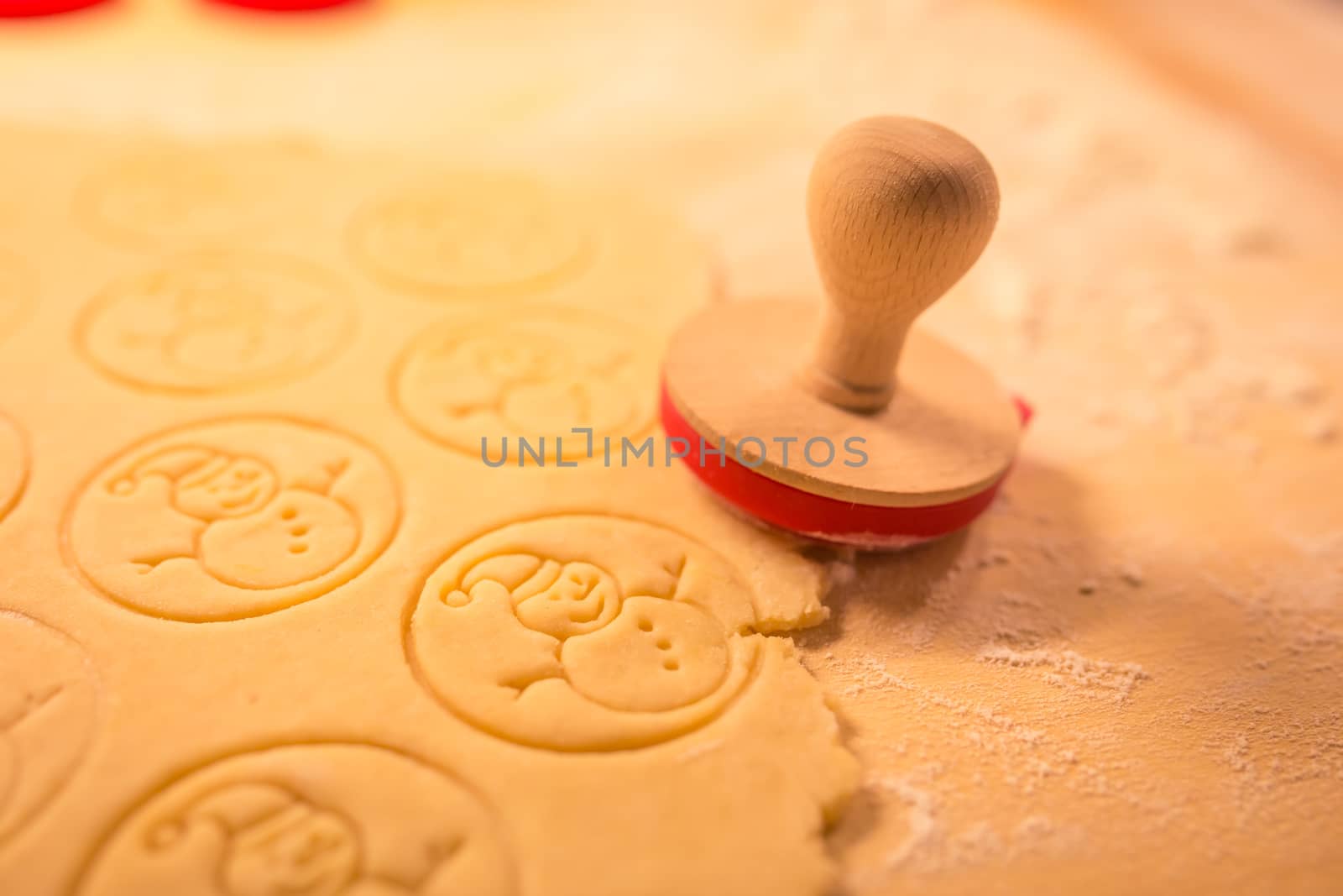 Christmas cookies bakery with raw biscuit dough and cutters with christmas theme shape - Christmas theme dough stamp, Snowman. by petrsvoboda91