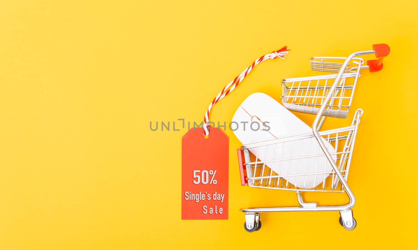 Online shopping Single's day sale text on red tag label have white mouse on cart shopping, with copy space on yellow background