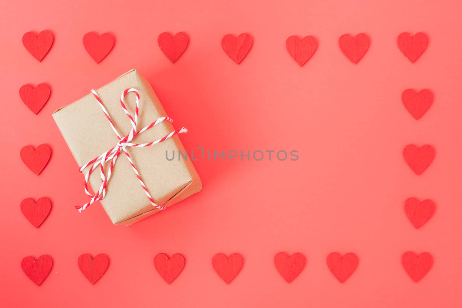 Valentine's Day background, Top view Flat lay Red heart round frame gift box on red background. Valentines day concept with copy space