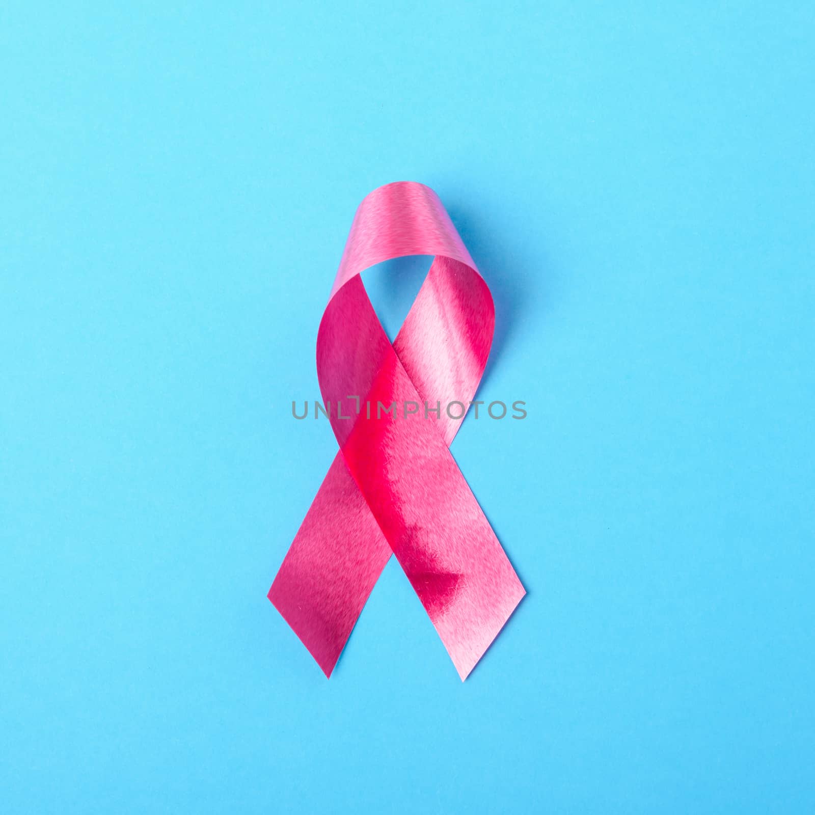 Breast cancer month concept, flat lay top view, pink ribbon  by Sorapop
