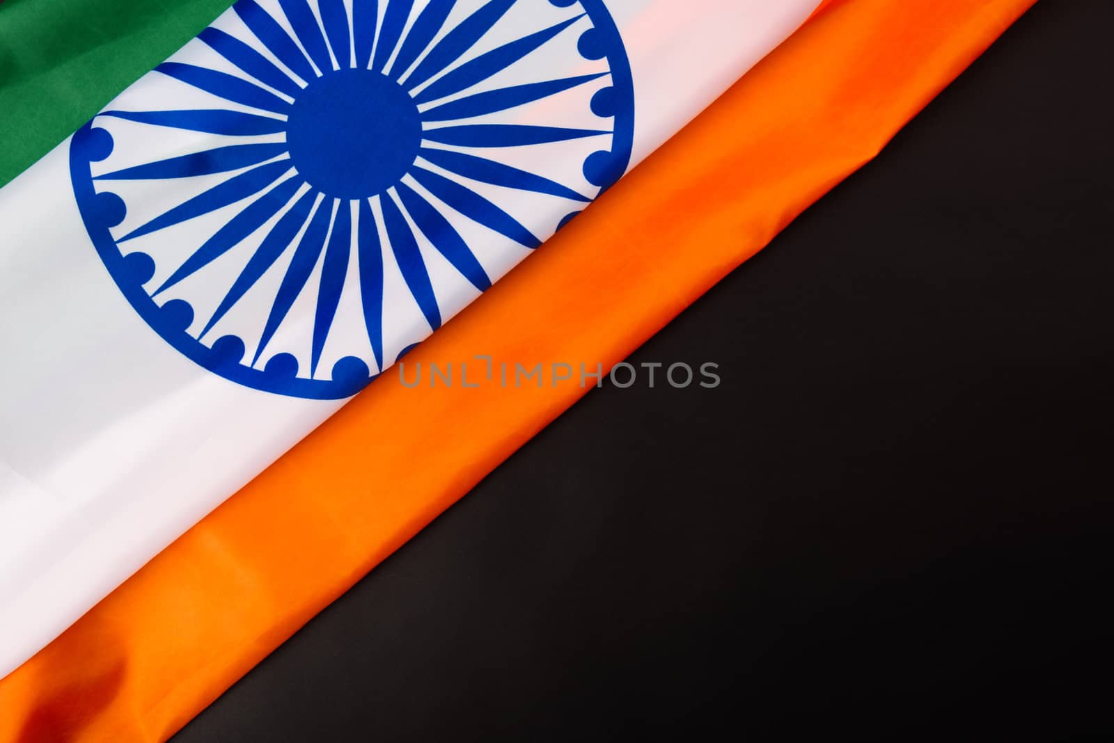 Indian republic day, flat lay top view, Indian flag on black background with copy space for your text