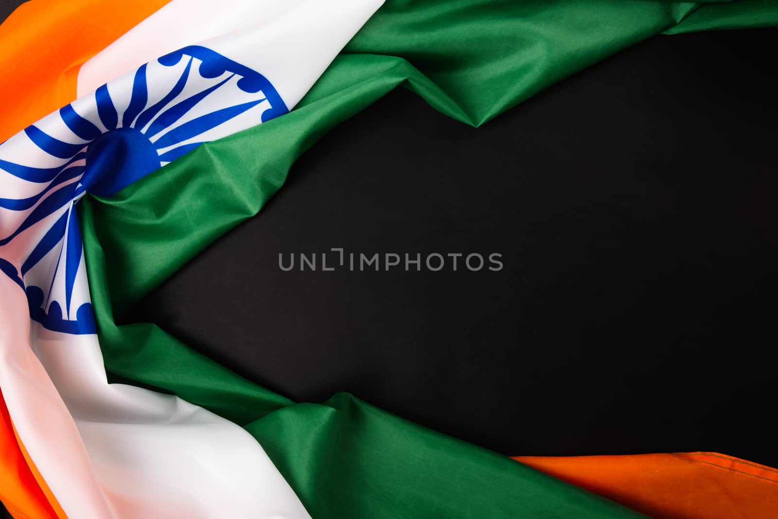 Indian republic day, flat lay top view, Indian flag on black background with copy space for your text