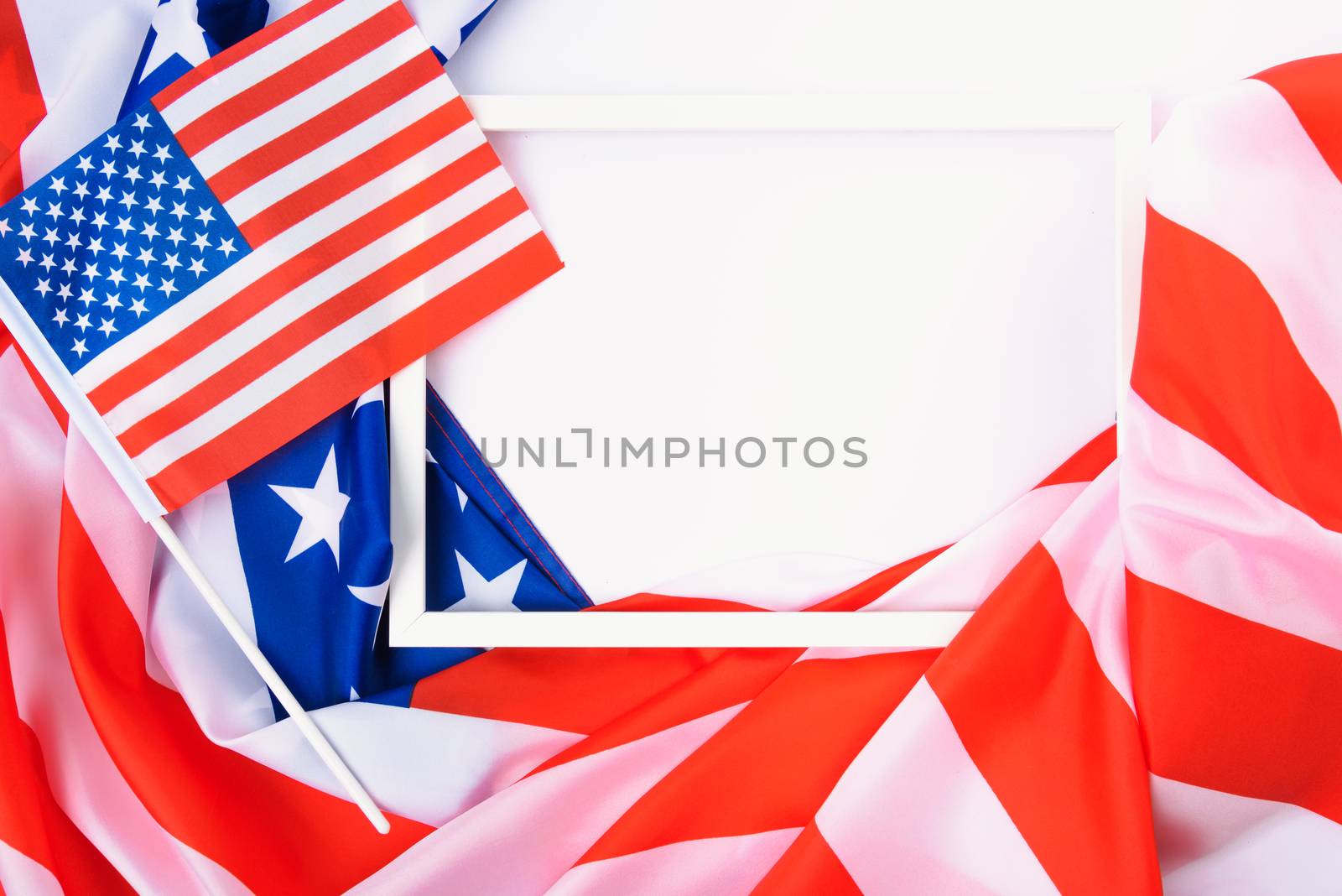 Martin luther king day, flat lay top view, American flag and photo frame on white background with copy space for your text