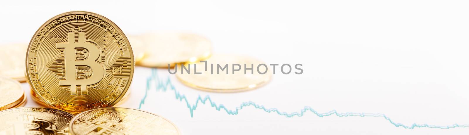 Gold coins with bitcoin sign and rate graph isolated on white background