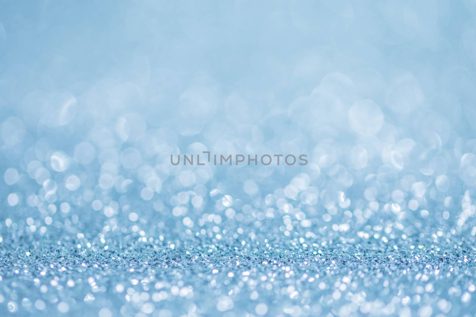 Blue twinkling lights bokeh light background Christmas new year design