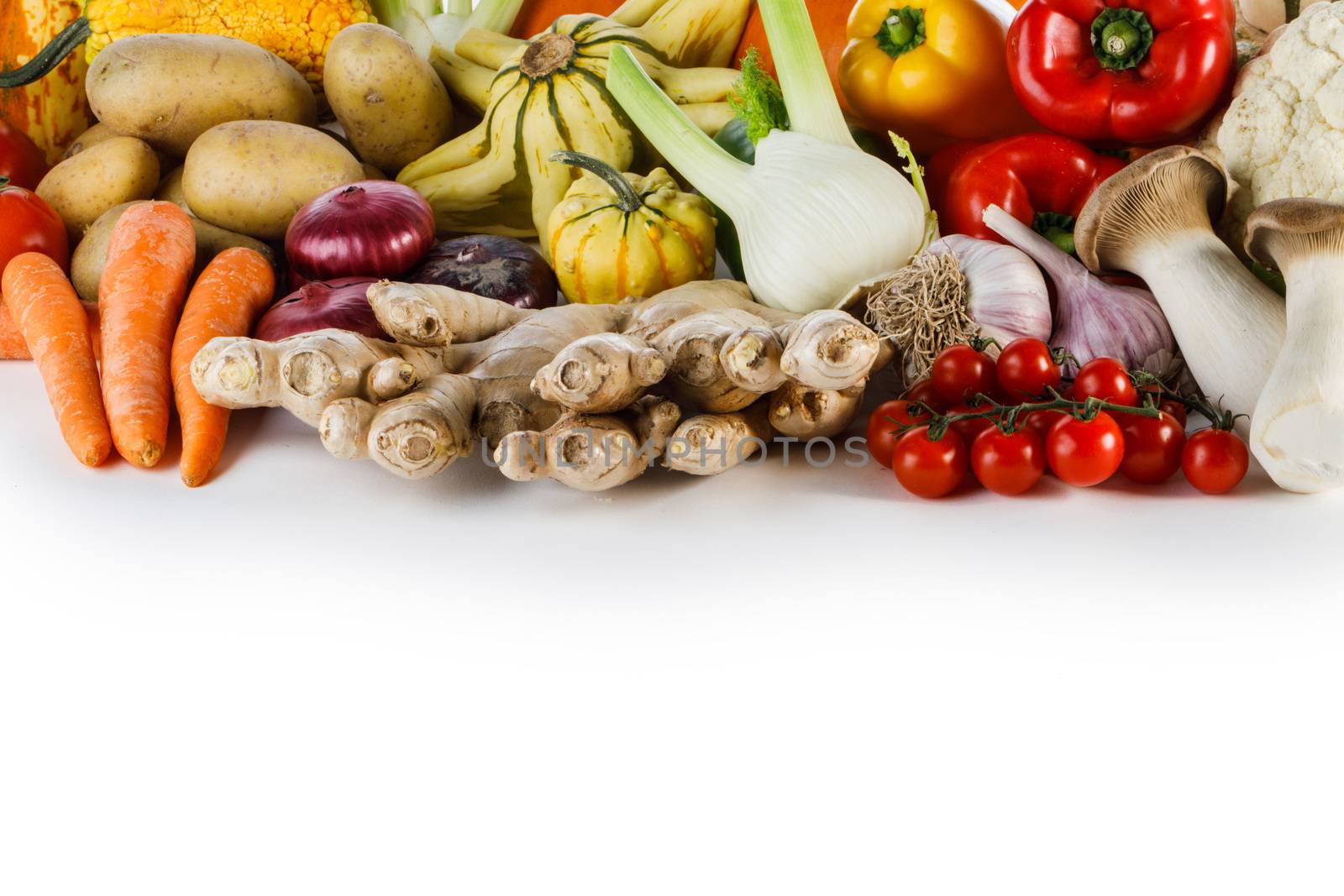 Harvest of many vegetables isolated on white background border frame with copy space for text