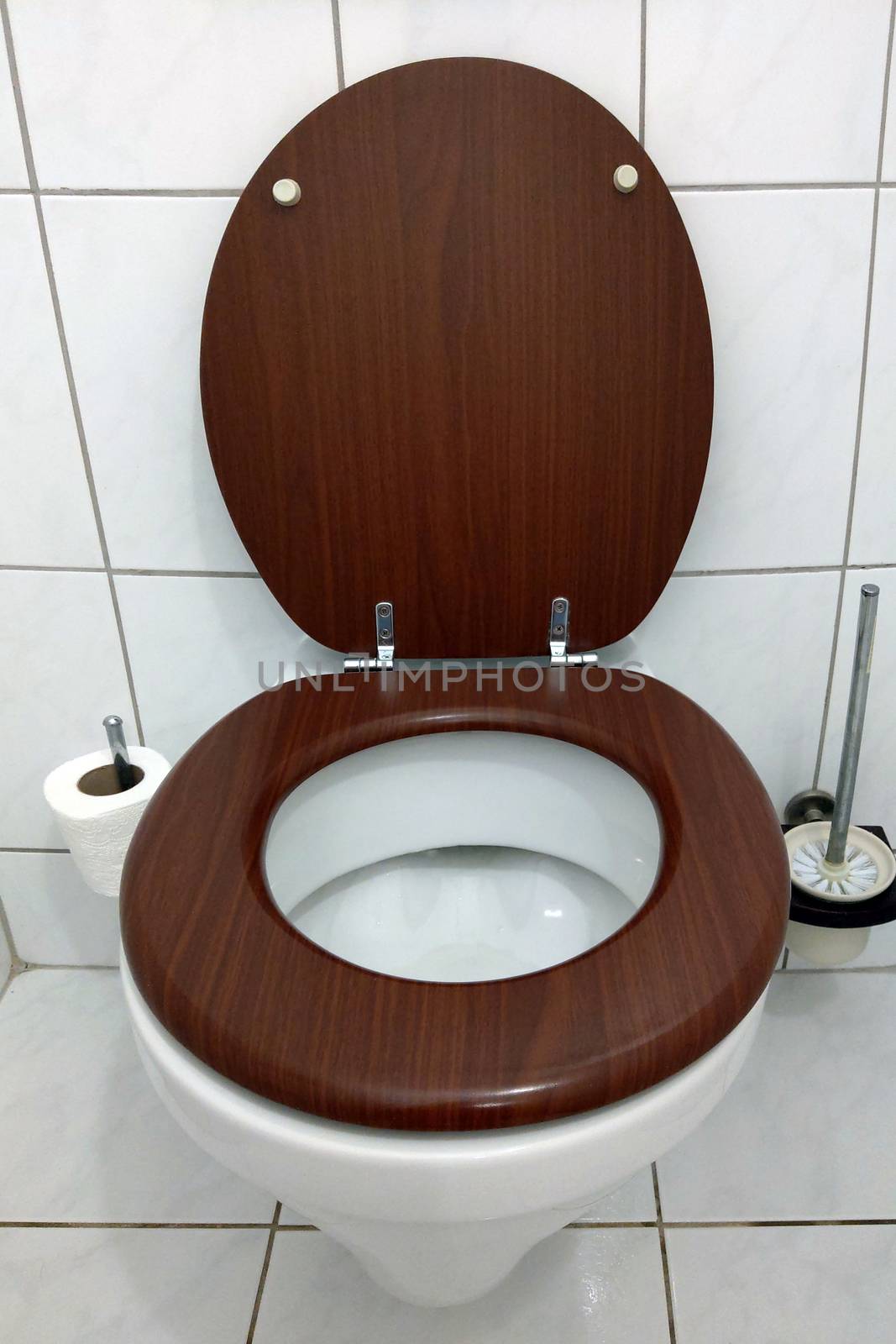 View of a ceramic toilet in a public toilet