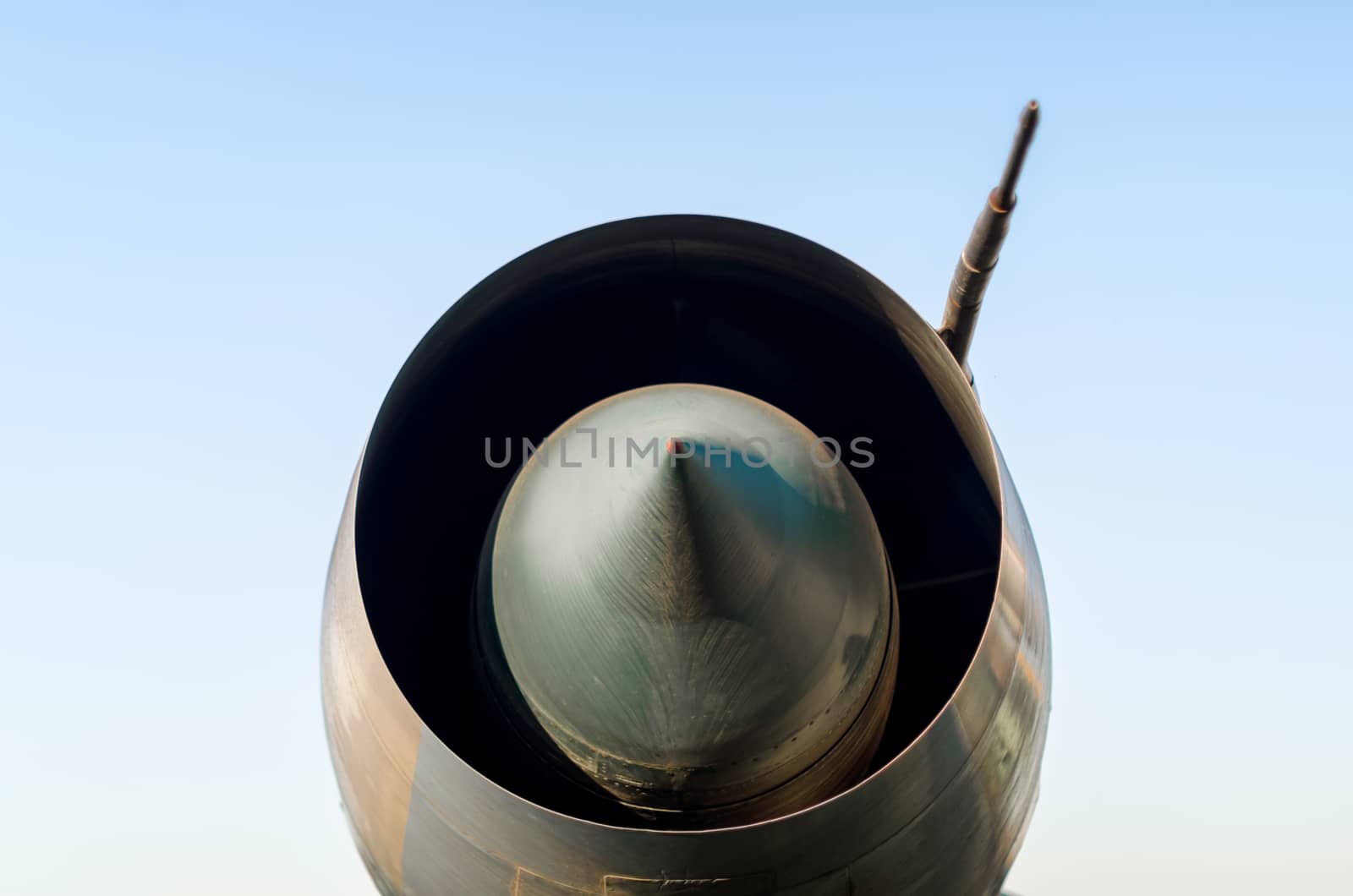 turbine old army military combat fighter aircraft isolated on blue sky background