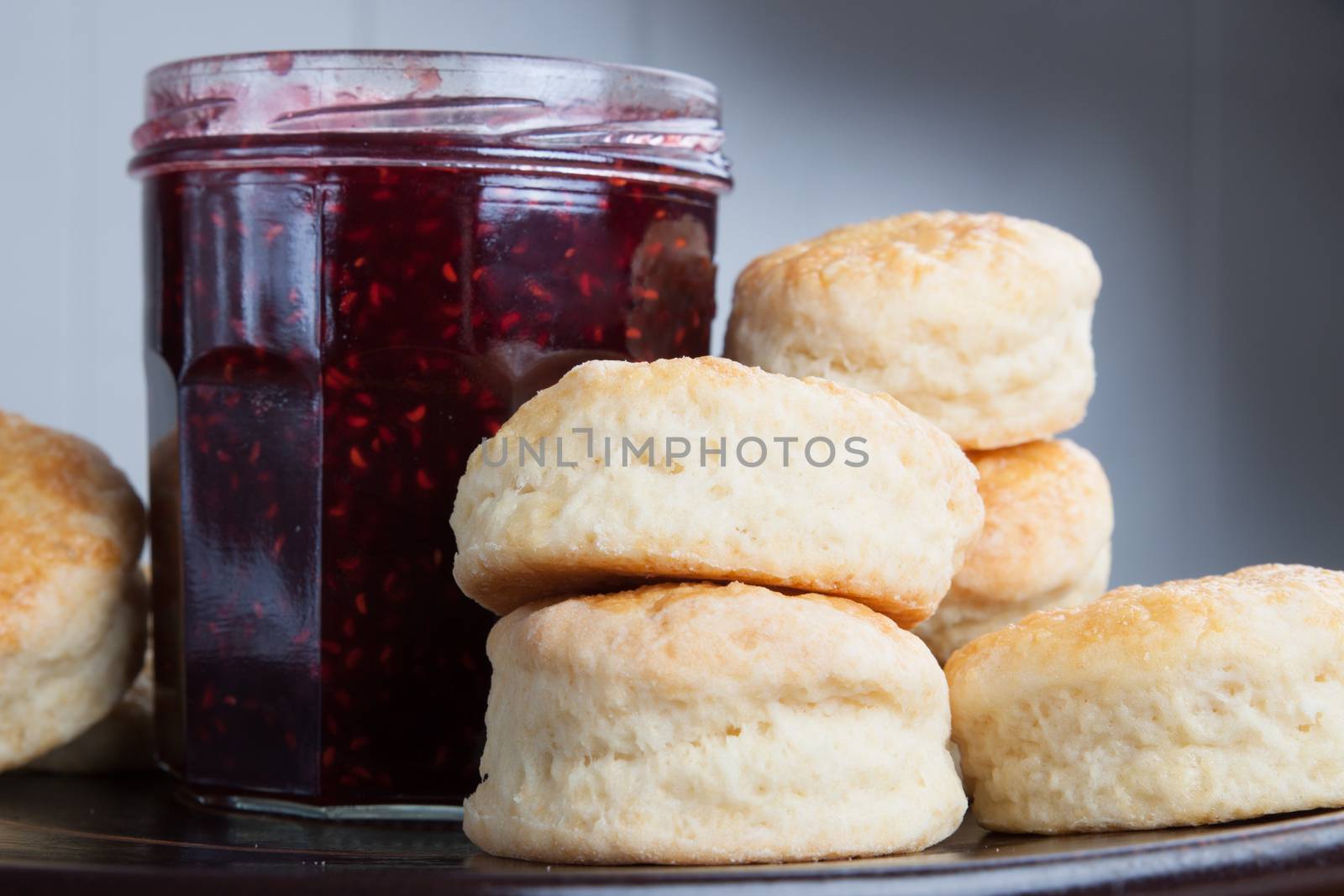 Homemade English scones for four o'clock tea in a plate by lanalanglois