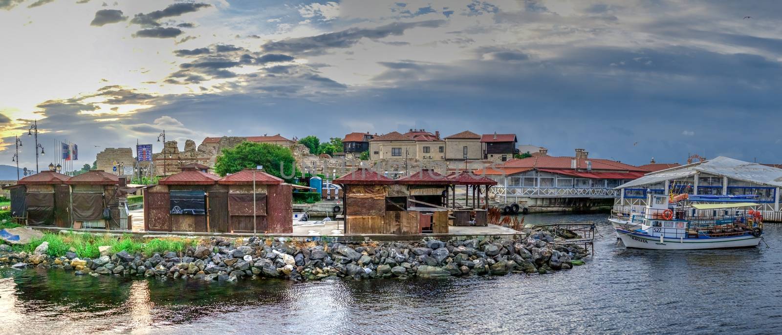 Nessebar, Bulgaria – 07.11.2019.  Pleasure boats at the pier of the old town of Nessebar in Bulgaria on a summer morning