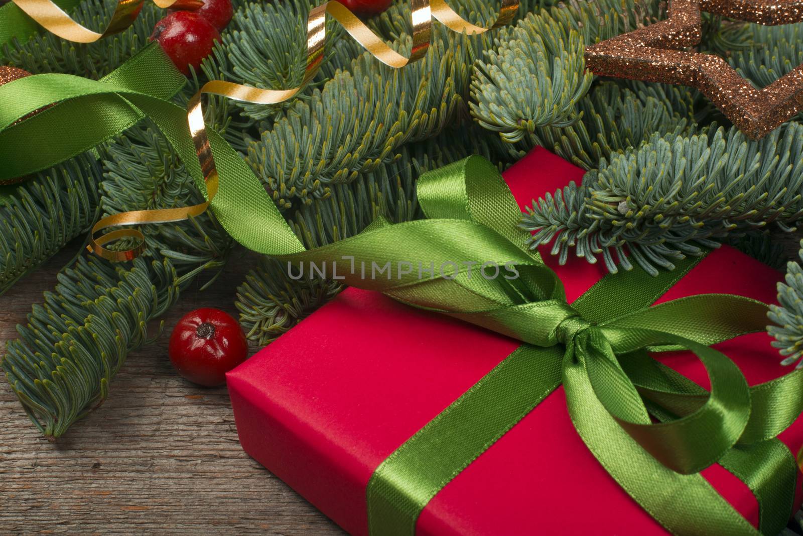 Christmas gift and fir branches by destillat