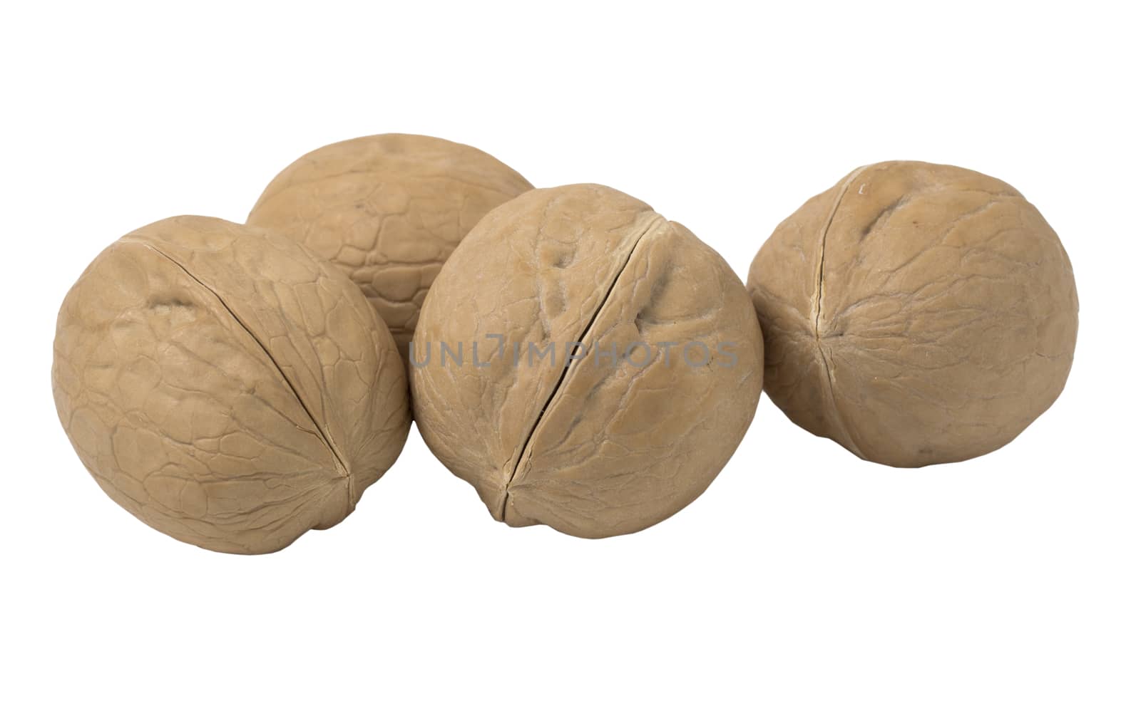Delicious whole walnuts, isolated on white background.