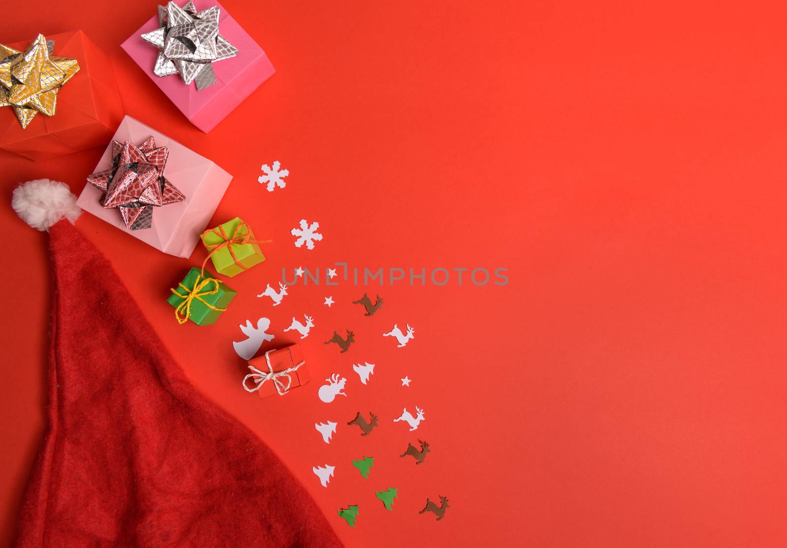Christmas or New Year background, plain composition made of Xmas decorations and fir branches, flat lay, blank space for a greeting text.