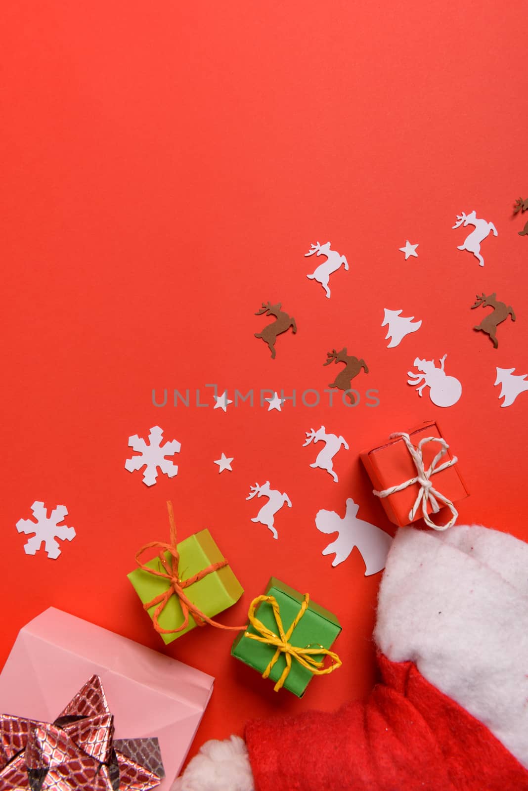 Christmas or New Year background, plain composition made of Xmas decorations and fir branches, flat lay, blank space for a greeting text.