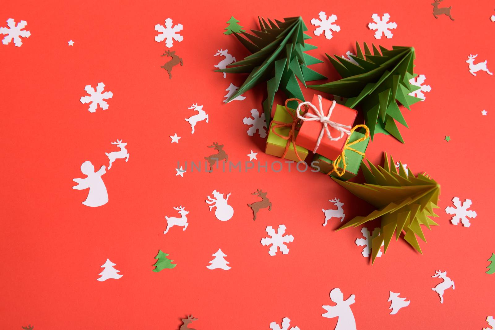 Christmas or New Year background, plain composition made of Xmas decorations and fir branches, flat lay, blank space for a greeting text.