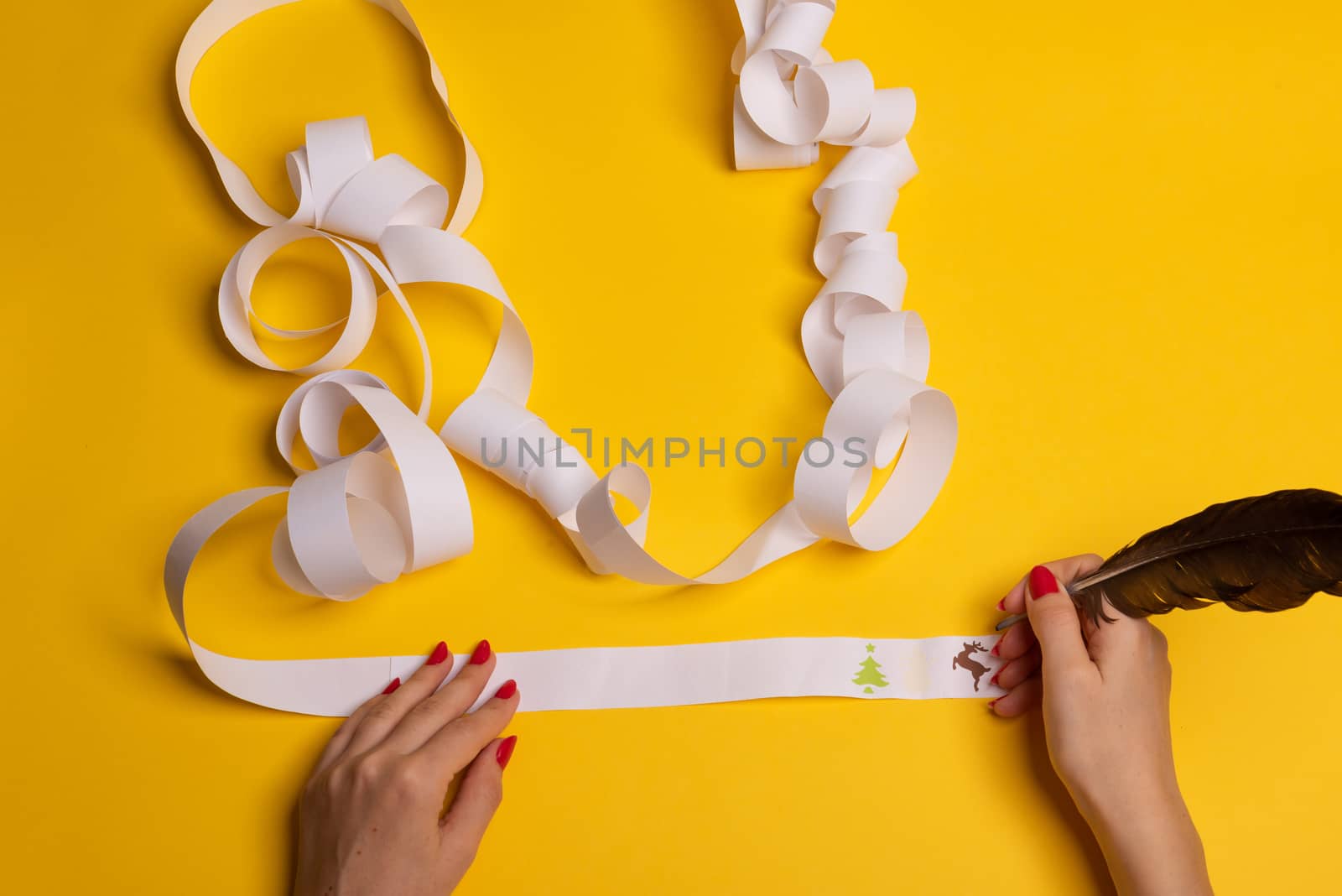 Long twisted expanded empty letter. Copy space. yellow background. View from above