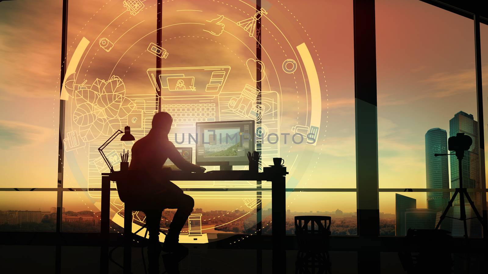 A photographer in his office looks at a virtual infographic against the backdrop of a bright sunset.
