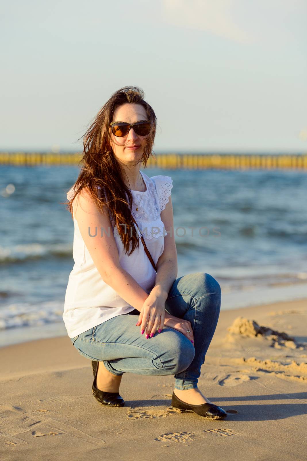 Portrait of smiling young woman enjoying the time.
