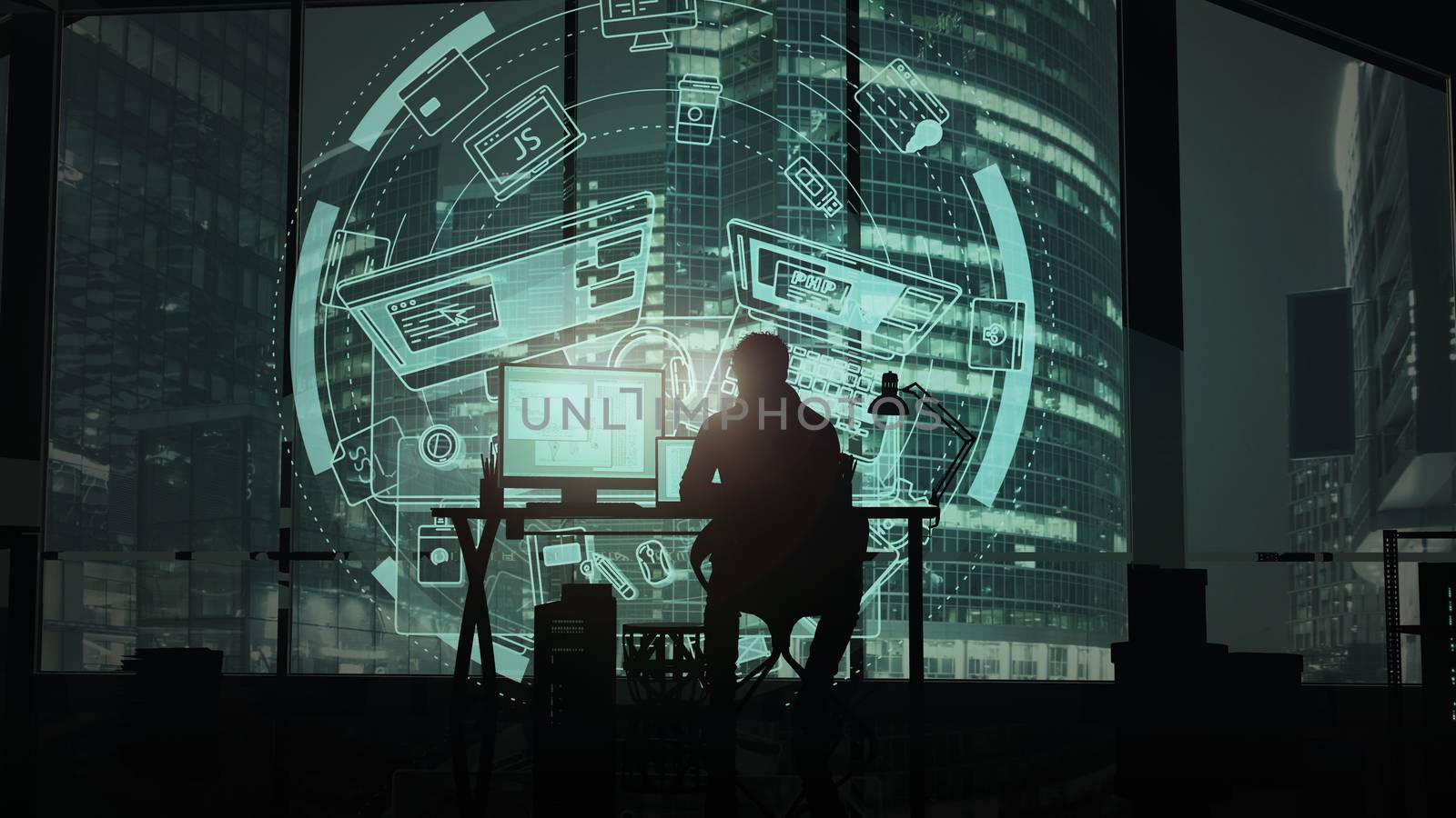 Silhouette of a programmer working in the office against the background of night skyscrapers and virtual infographics.