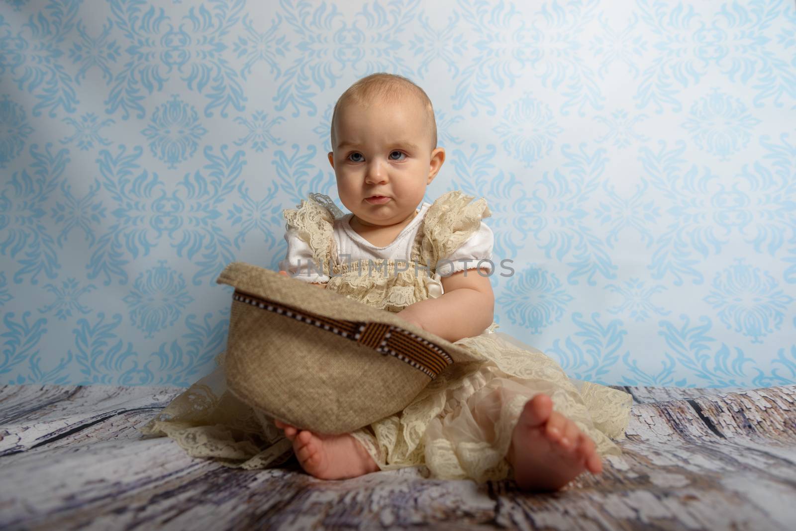 Portrait of adorable baby girl. Childhood.