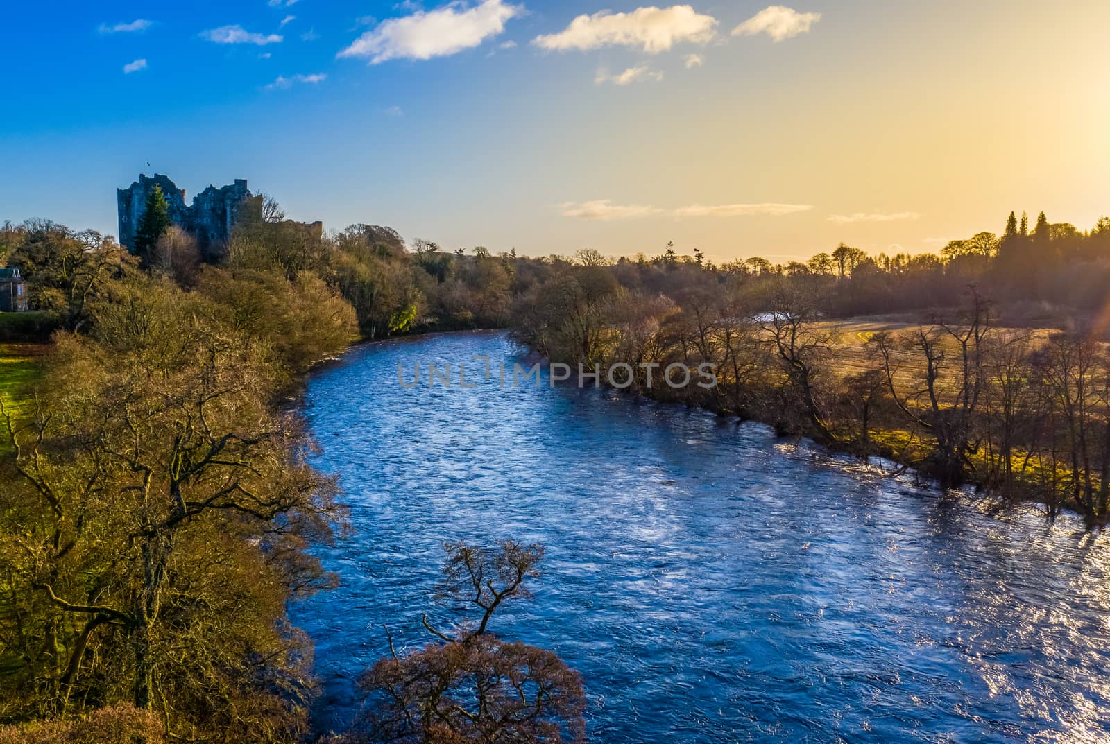 A River And Castle In Scotland In The Beautiful Morning Light