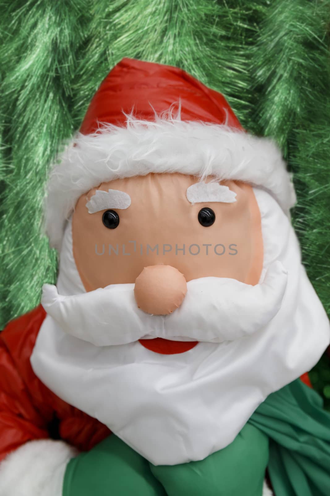 Christmas decoration on abstract background. New Year's Santa Claus is a traditional Christmas decoration.