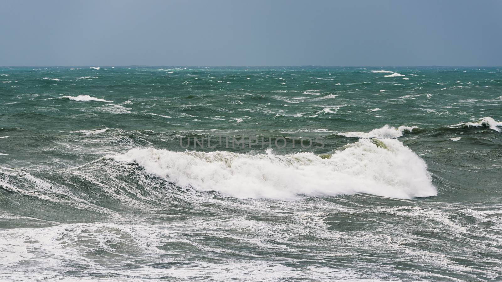 Rough sea by a stormy weather day by dutourdumonde