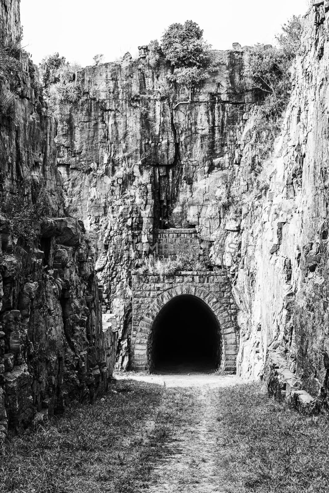 The western entrance of the historic railroad tunnel at Waterval Boven in Mpumalanga. Monochrome