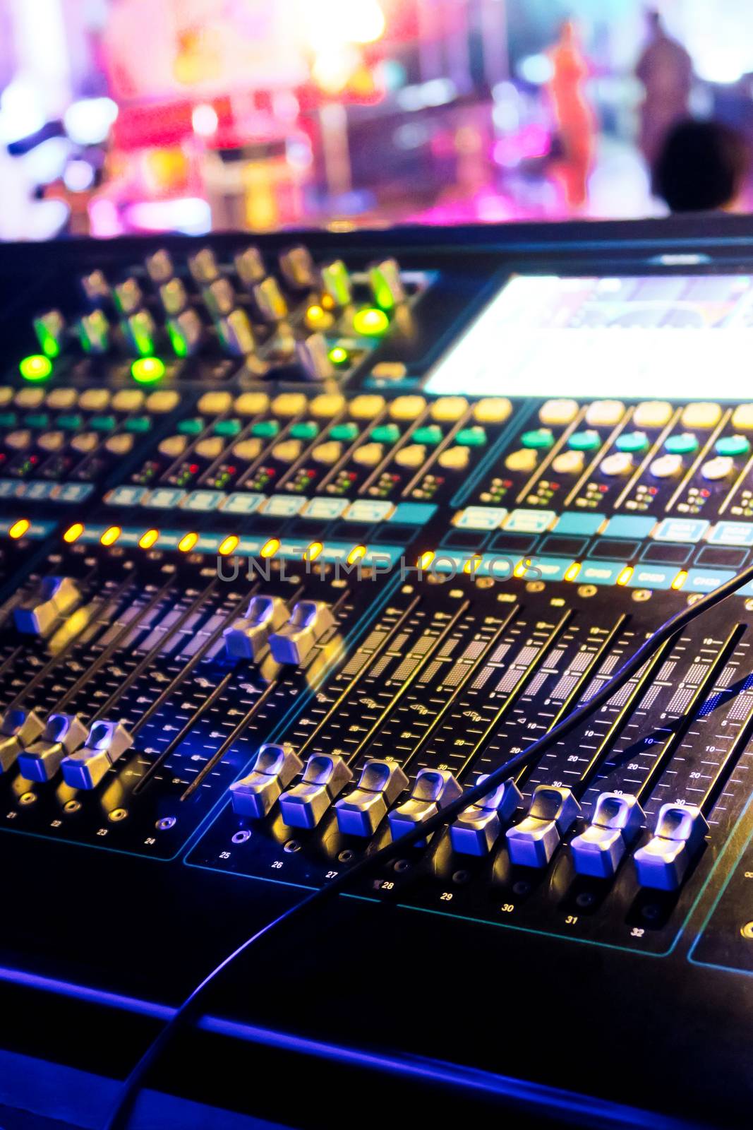 Closeup of an audio mixing control panel