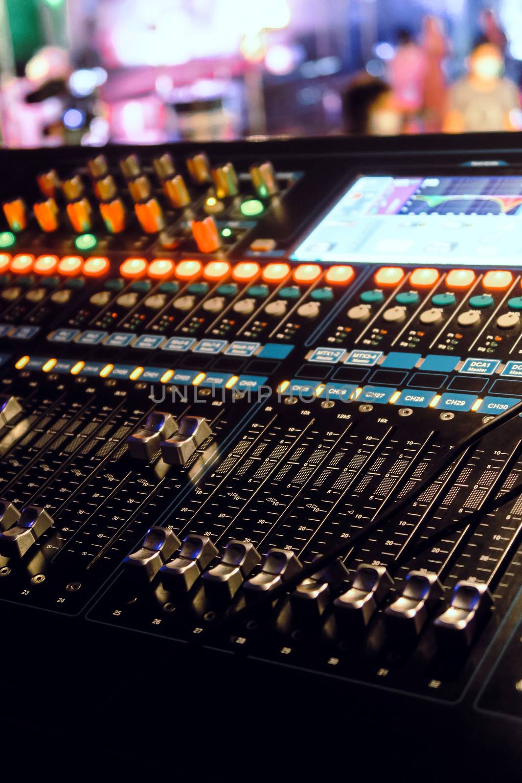 Closeup of an audio mixing control panel